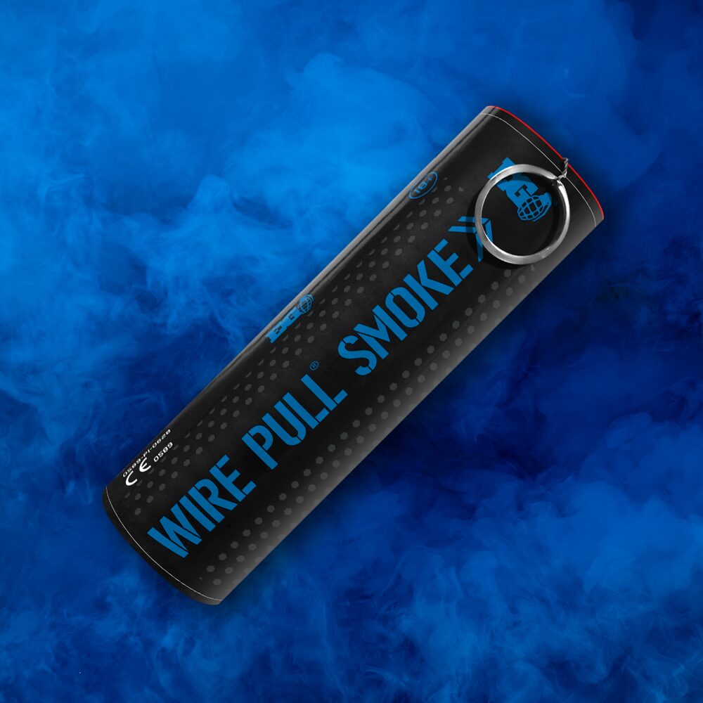 Blue WP40 smoke bomb deploying dense blue smoke