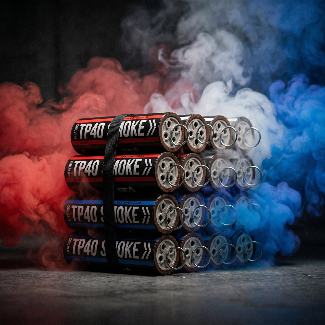 Red and blue smoke pouring across a dark studio surface, showing how dense colored smoke spreads horizontally