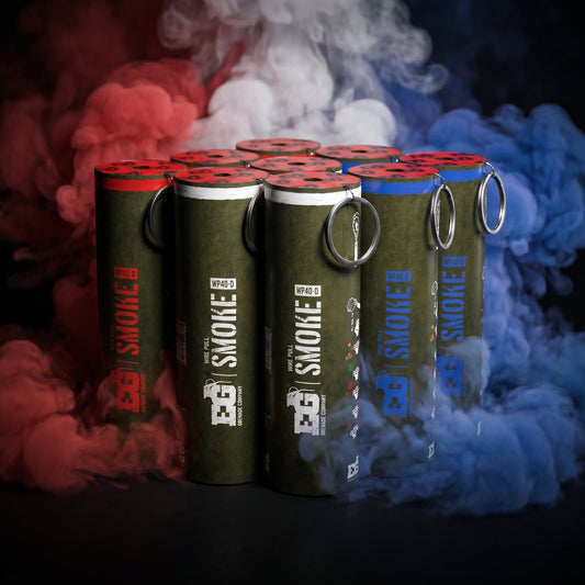 lineup of smoke canisters with red, white and blue smoke in a studio