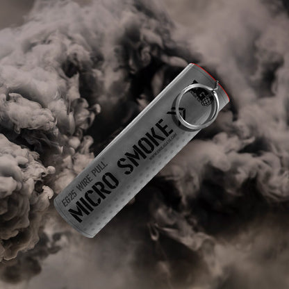 Black EG25 smoke grenade emitting dense black smoke