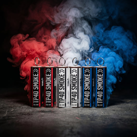 Shutter Bombs — Clean explosive hero PRODUCT photo of a 6-pack bundle of TP40 smoke grenades: 6 canisters in