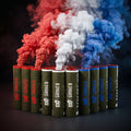 Shutter Bombs — Clean explosive hero PRODUCT photo of a 12-pack bundle of WP40-D wire-pull smoke grenades: 12 olive-green