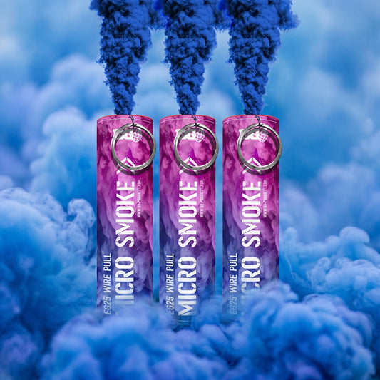 Shutter Bombs — A premium e-commerce gender-reveal product hero of the THREE EG25 Micro Smoke canisters shown in the